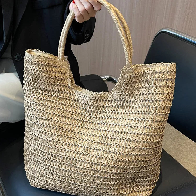Women's large capacity straw bag in beige with canvas lining and double shoulder straps