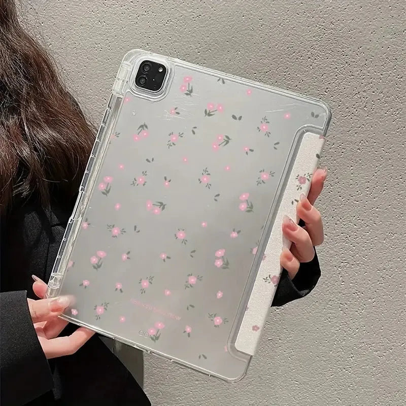 Transparent floral tri-fold iPad case showing magnetic stand function and clear polycarbonate construction