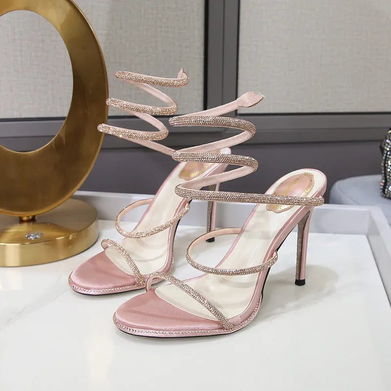 Women's rhinestone ankle-strap stiletto sandals with satin upper, round toe, and 10cm heel in silver colour