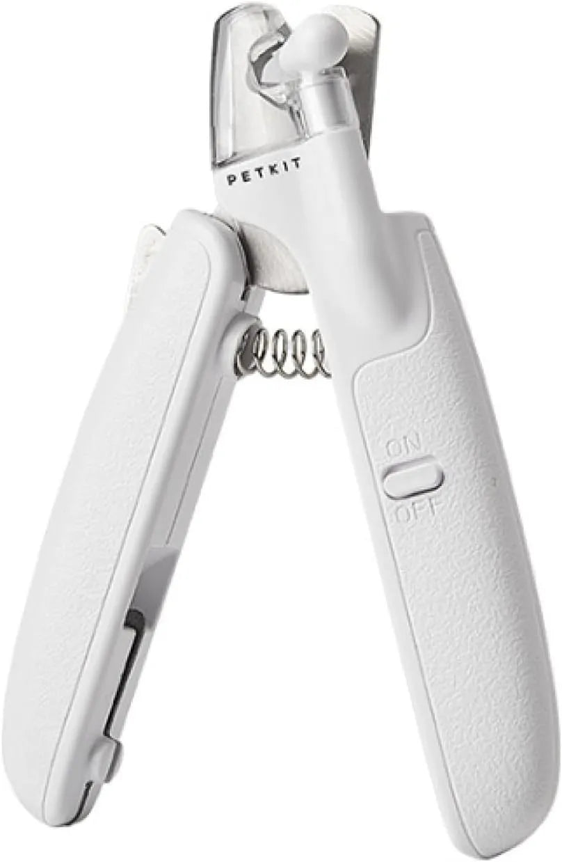 White pet nail clippers with LED light, transparent guard, and built-in file for cats and dogs.