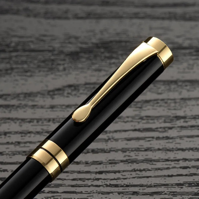 Metal fountain pen with gold clip for calligraphy practice and writing