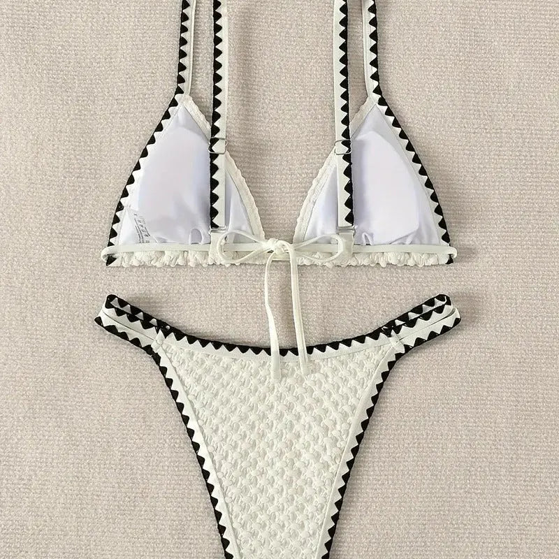 Women's split bikini swimsuit in briefs style available in white or blue colours