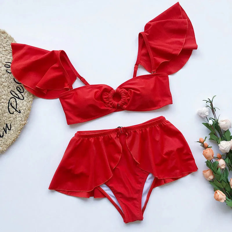 Women's red flounced three-piece bikini swimsuit with nylon construction