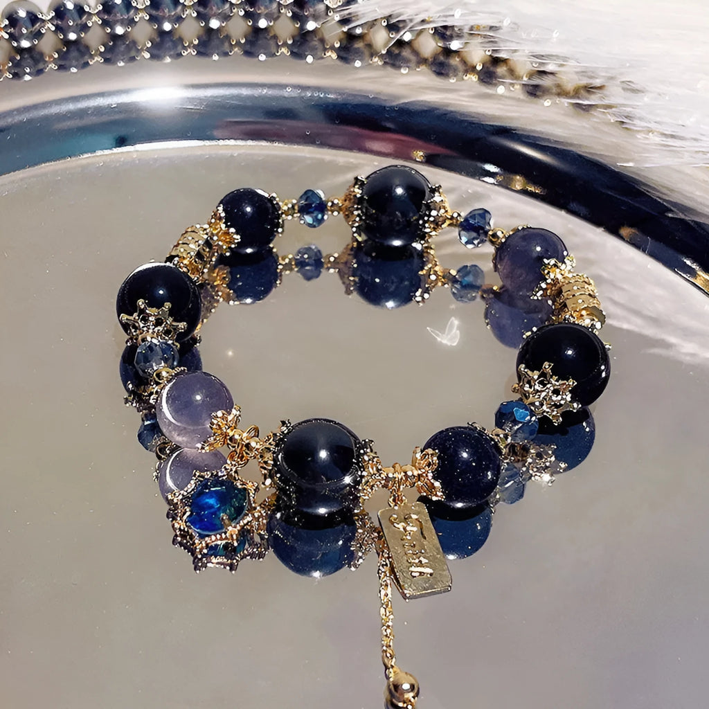 Women's sweet style galaxy colour alloy bracelet with snowflake pendant, heart, bow and cartoon character charms.