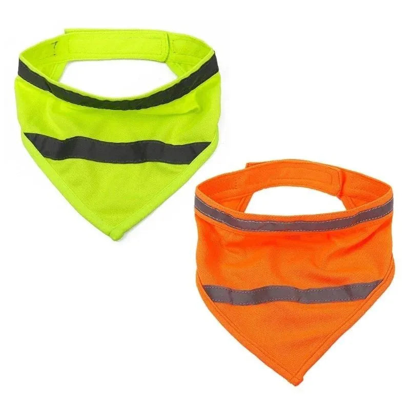 Yellow and orange reflective dog bandana with adhesive strap, shown on a dog's neck.