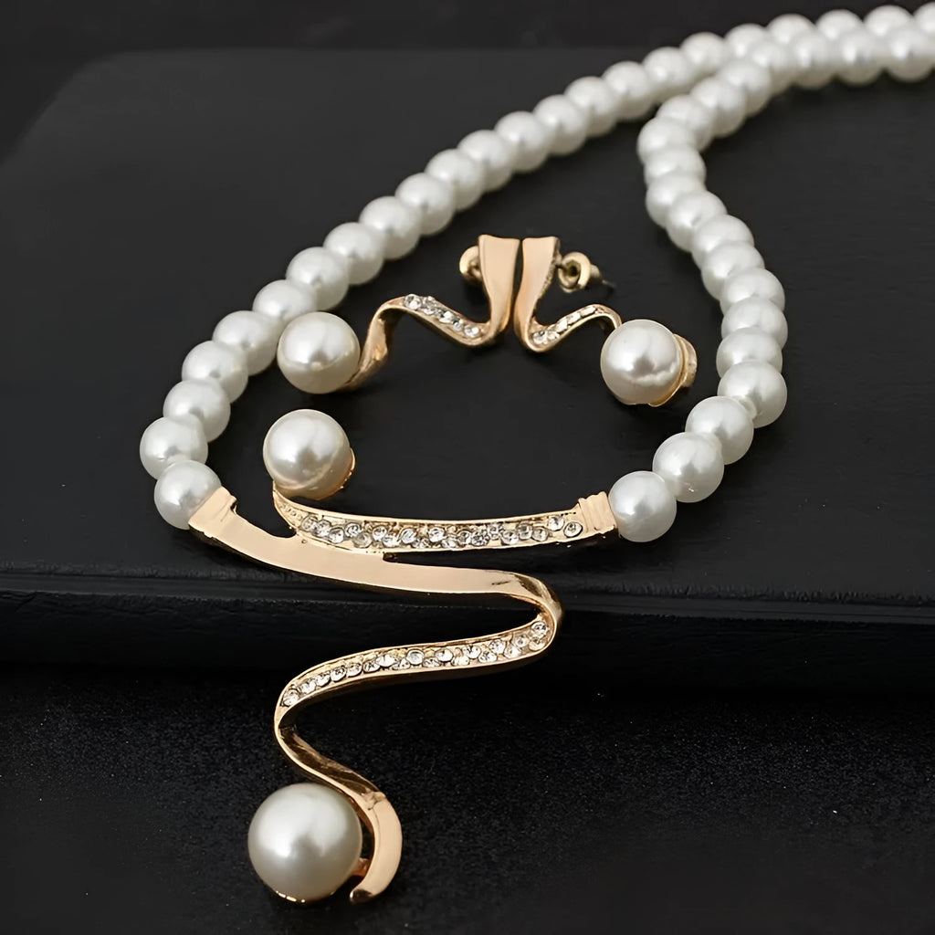 Gold pearl necklace and earrings set with deep V clavicle design and drop-shaped pendant