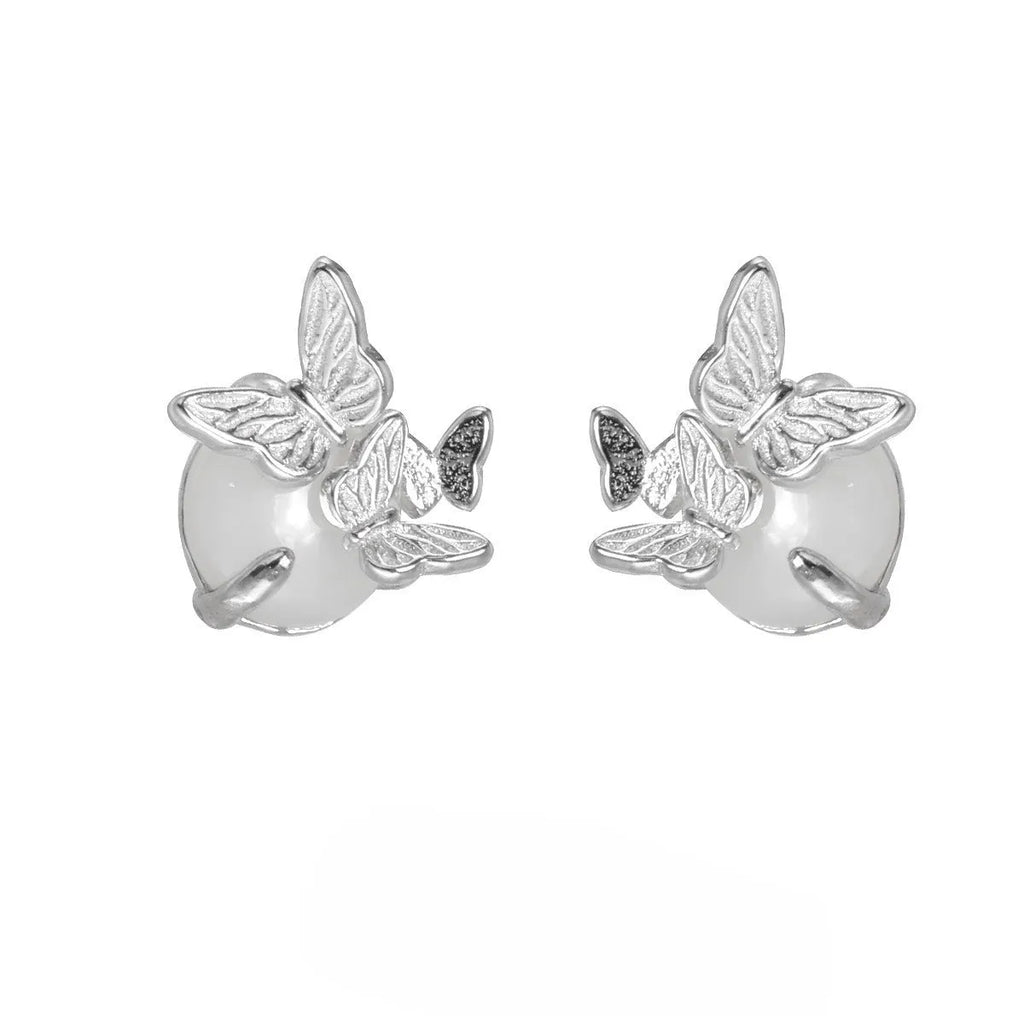 Original design butterfly ear studs in 925 silver with gold electroplated finish.