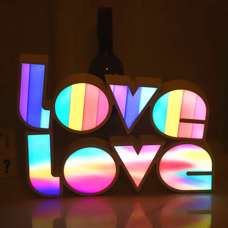 Rainbow-colour plastic LED LOVE light decoration measuring 35.5cm tall with 'LOVE' lettering