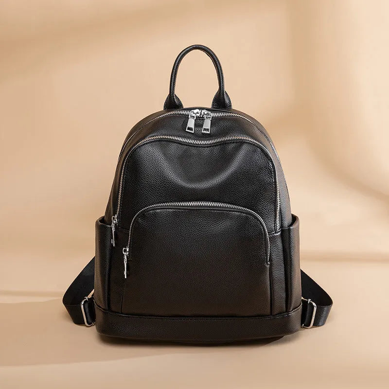 Soft PU leather women's large capacity backpack in black, tan or coffee purple with anti-theft zip and slit pocket
