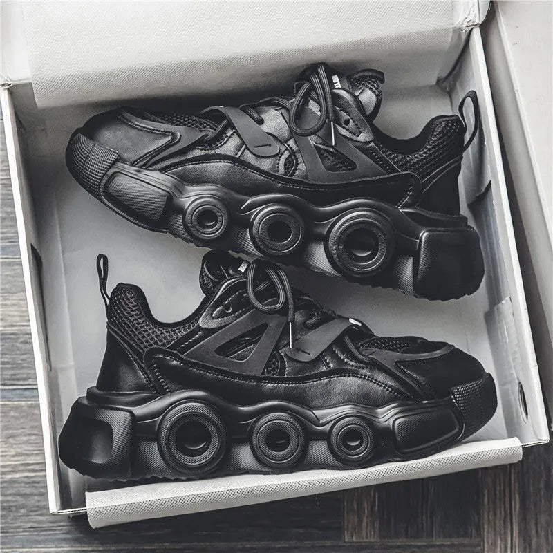 Men's black thick-soled casual sneakers with breathable mesh upper and round toe.