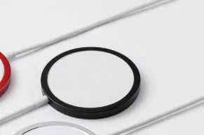 Silver metal magnetic wireless charging pad compatible with iPhone MagSafe