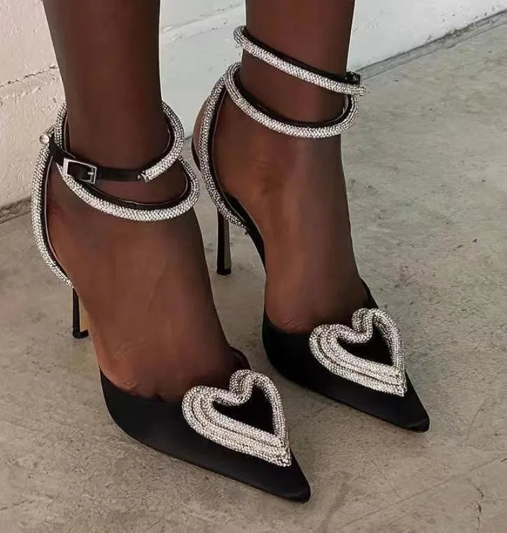 Women's pink satin sandals with heart-shaped rhinestones and adjustable cross-band straps