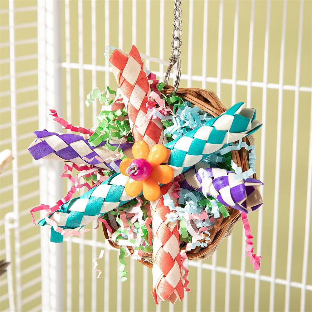 Parrot gnawing molar toy with wooden chewing pieces and plastic components for bird enrichment