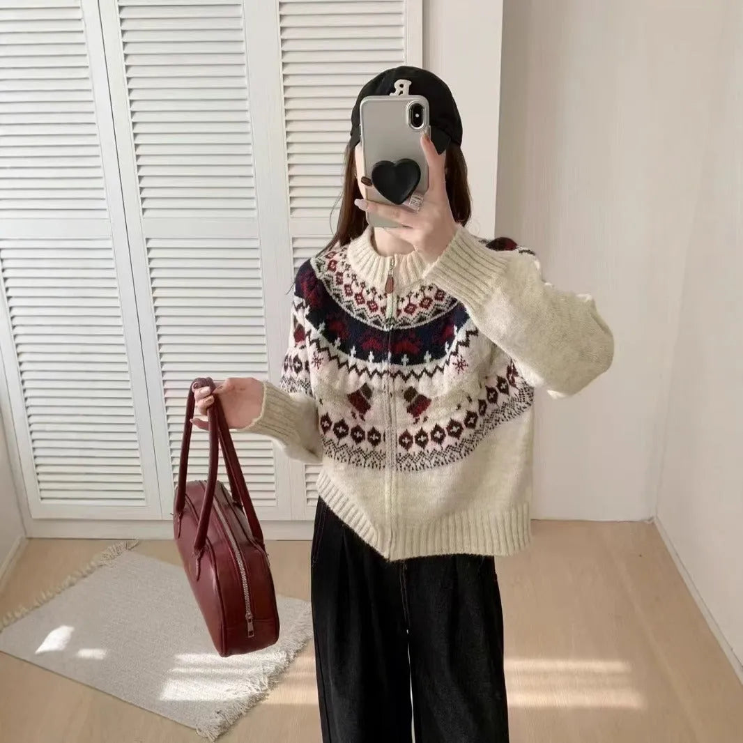 Apricot ethnic jacquard pullover sweater with 3D pattern and round neck.