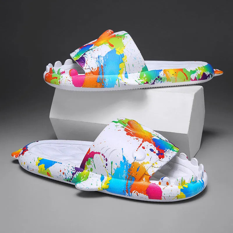 Shark design open-toe EVA slippers in various colours on a white background