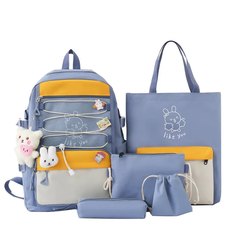 Nylon student backpack four-piece set in pink, black, purple, and blue with curved shoulder straps