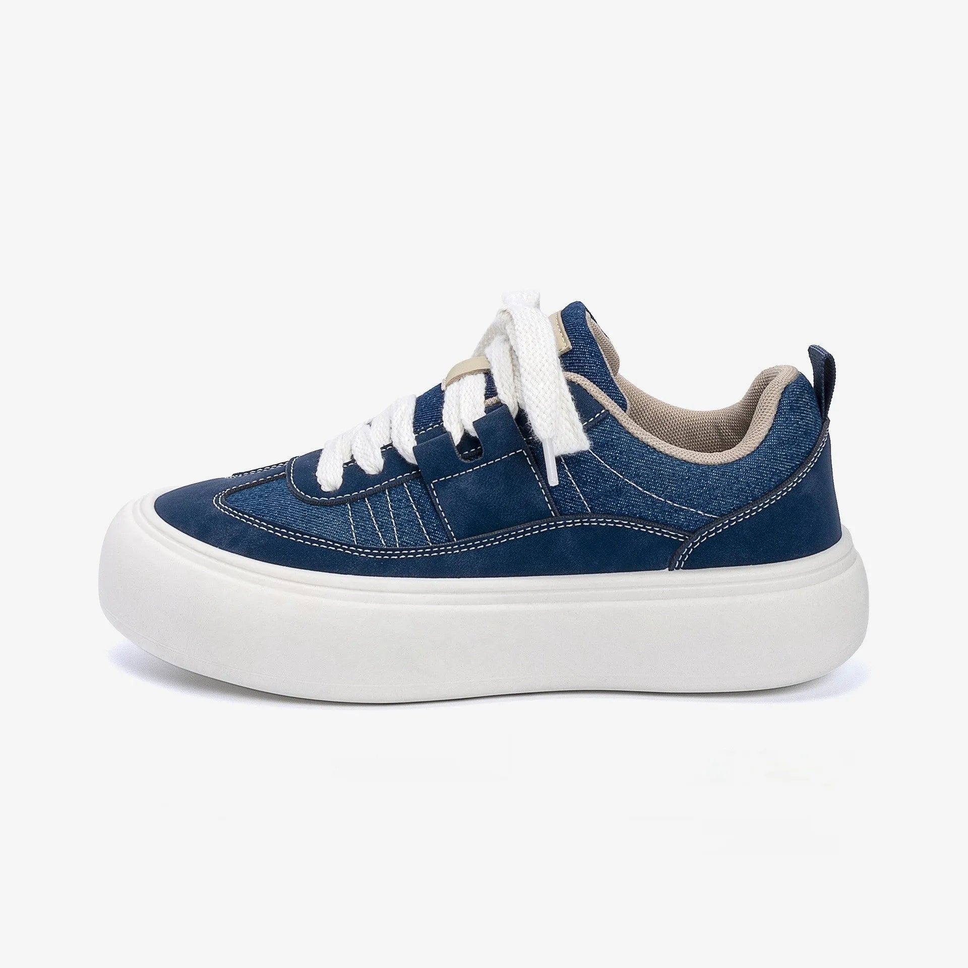 Men's black platform canvas trainers with lace-up front and raised sole on a white background