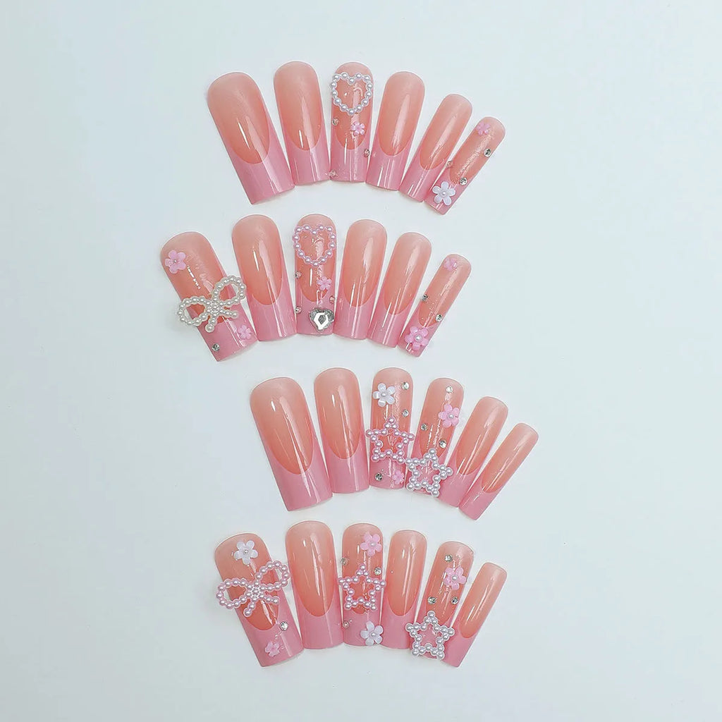 Super long French style artificial press-on nails with a decorative bow and spot drill accents in colour XB-70-48.