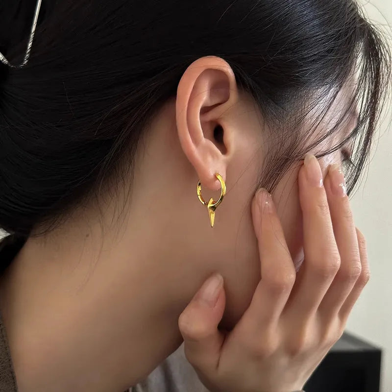 Geometric star-shaped ear clips for women with platinum electroplated finish on copper base