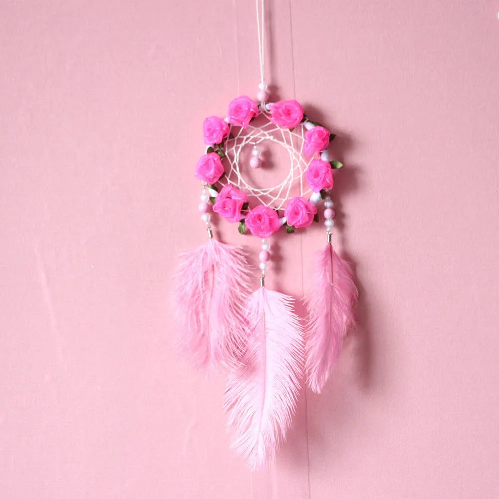 Pink dreamcatcher wind chime with ostrich feather ornaments, 10cm diameter wall decoration