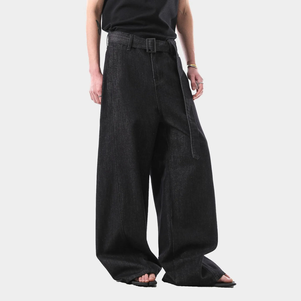 Black women's high waist straight leg jeans with gold detailing and a zip fly.