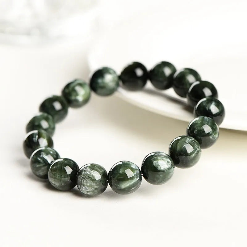 Green Dragon Crystal bracelet with 8-9mm round beads and Ruyi design element.