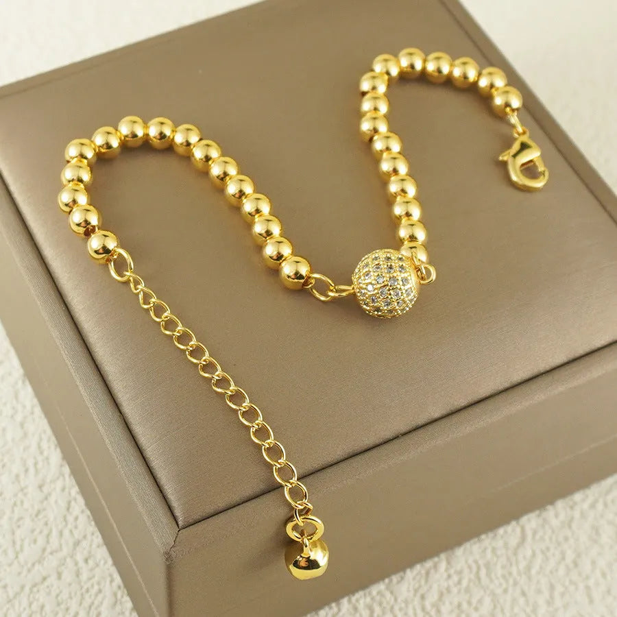 Arabic style women's copper bracelet with heart-shaped pendant featuring single zircon stone