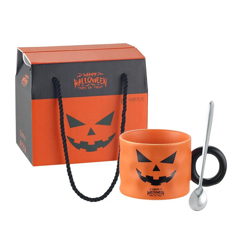 Orange pumpkin ceramic cup with handle and dessert spoon in gift box packaging