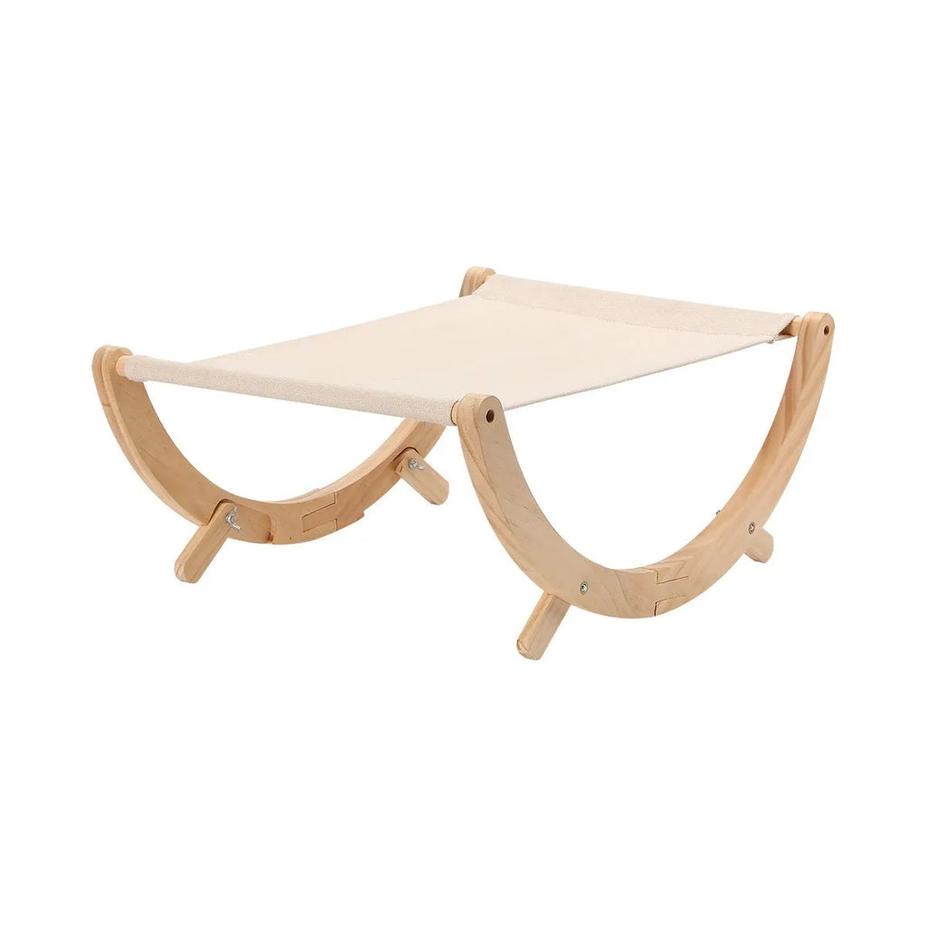 Solid wood foldable cat hammock bed with a neutral cushion on a wooden frame.