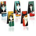 Set of five magnetic bookmarks with cute cat designs in assorted colours, displayed on a book page