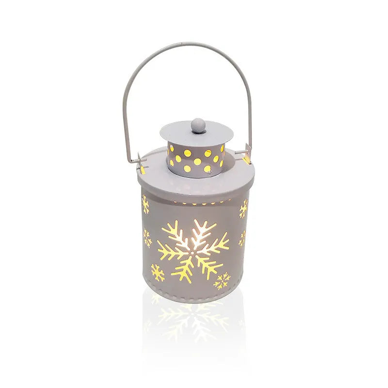 Nordic style LED Christmas candle lantern with wrought iron construction showing flickering light effect