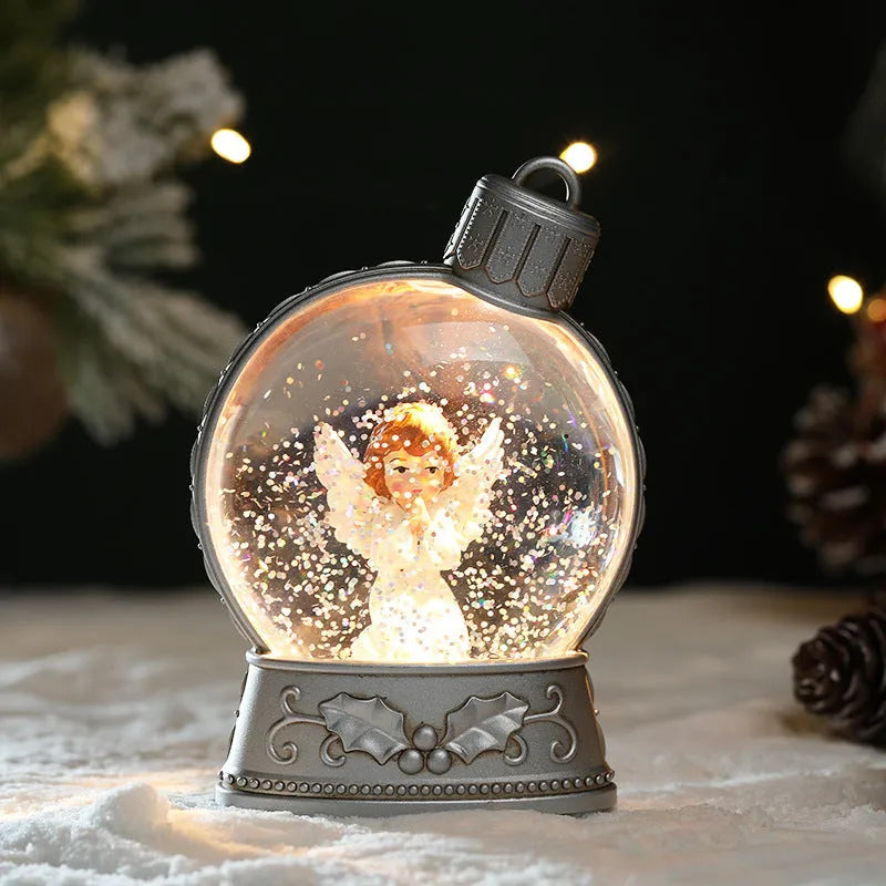 Set of four battery-powered LED Christmas decoration figures including old man, snowman, child tree and angel