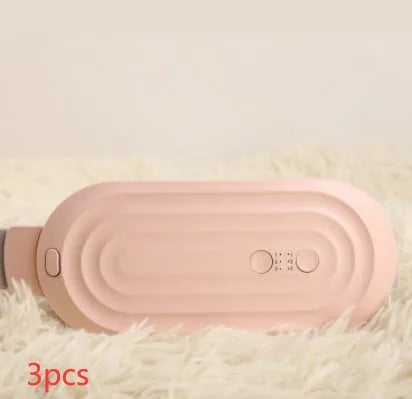 Pink menstrual heating pad with controller displaying temperature settings and vibration options