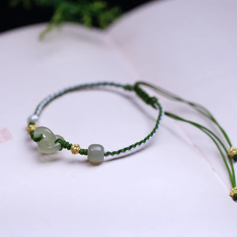 Natural Hetian jade woven bracelet with hollow-out design on flexible wire with silver or gold-plated elements