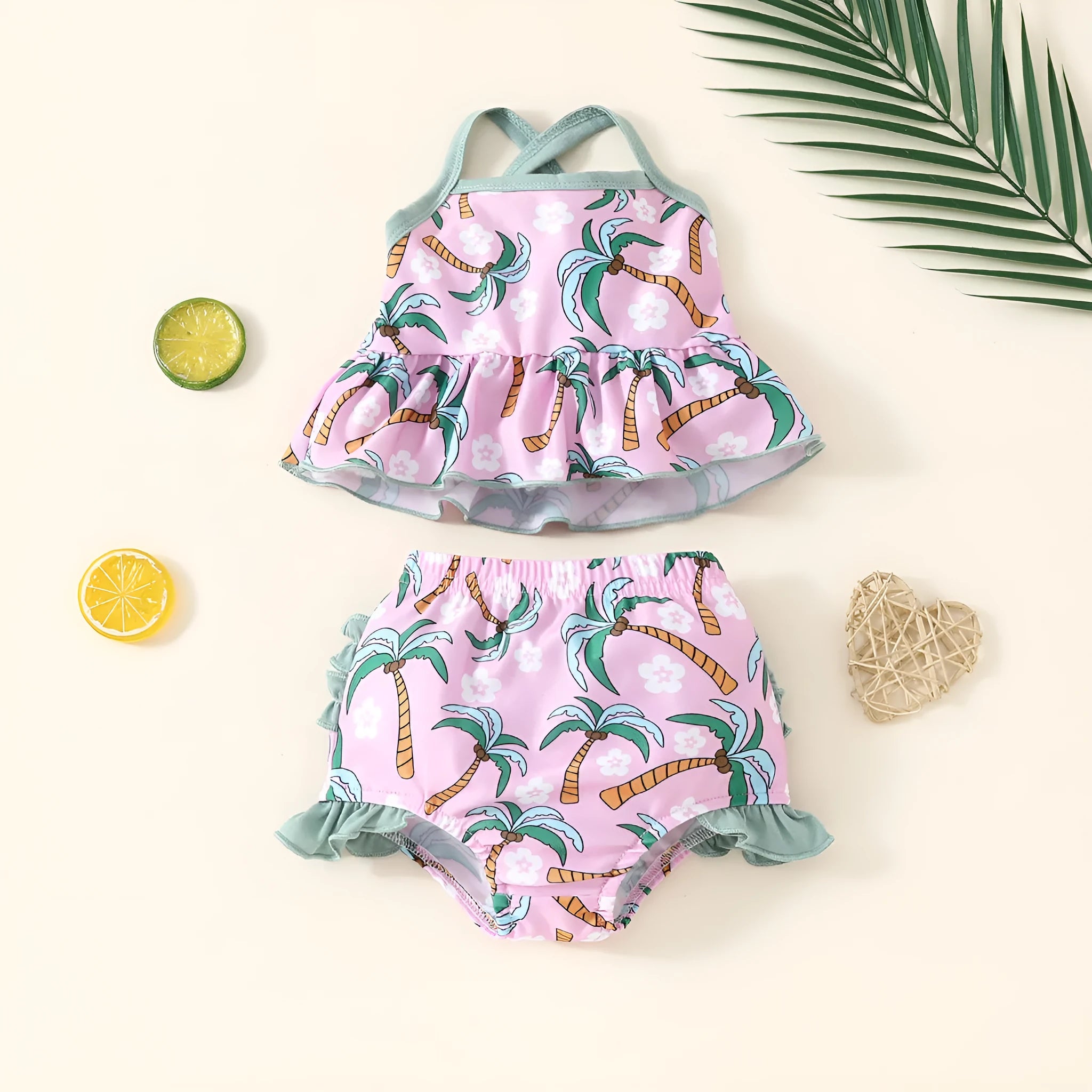 White polyester two-piece swimsuit set for girls, featuring a shirt and shorts.