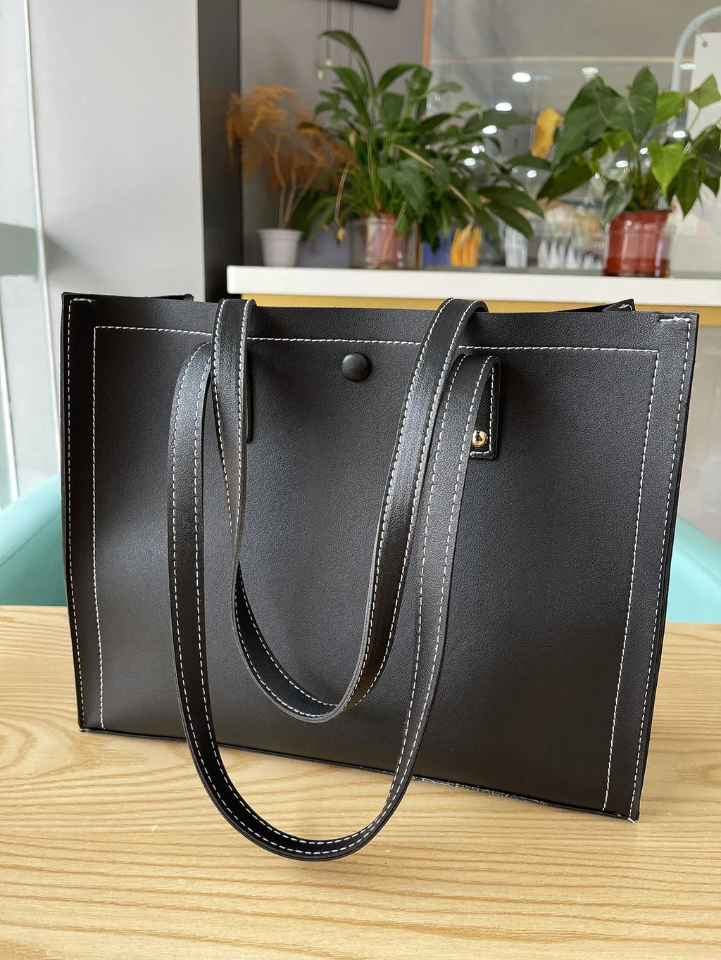 PU embossed crossbody tote bag with contrast colour stitching, horizontal square shape, black and brown option