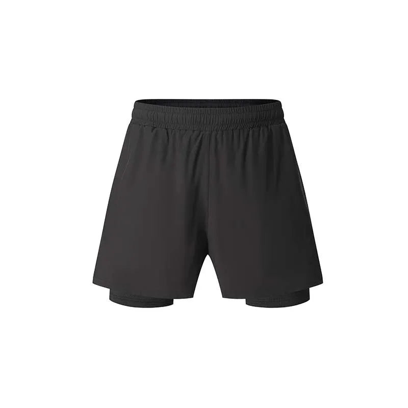 Men's black double-layer running shorts with inner liner on a man running outdoors.