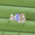 Women's flower pearl open ring with zircon stones in light purple colour