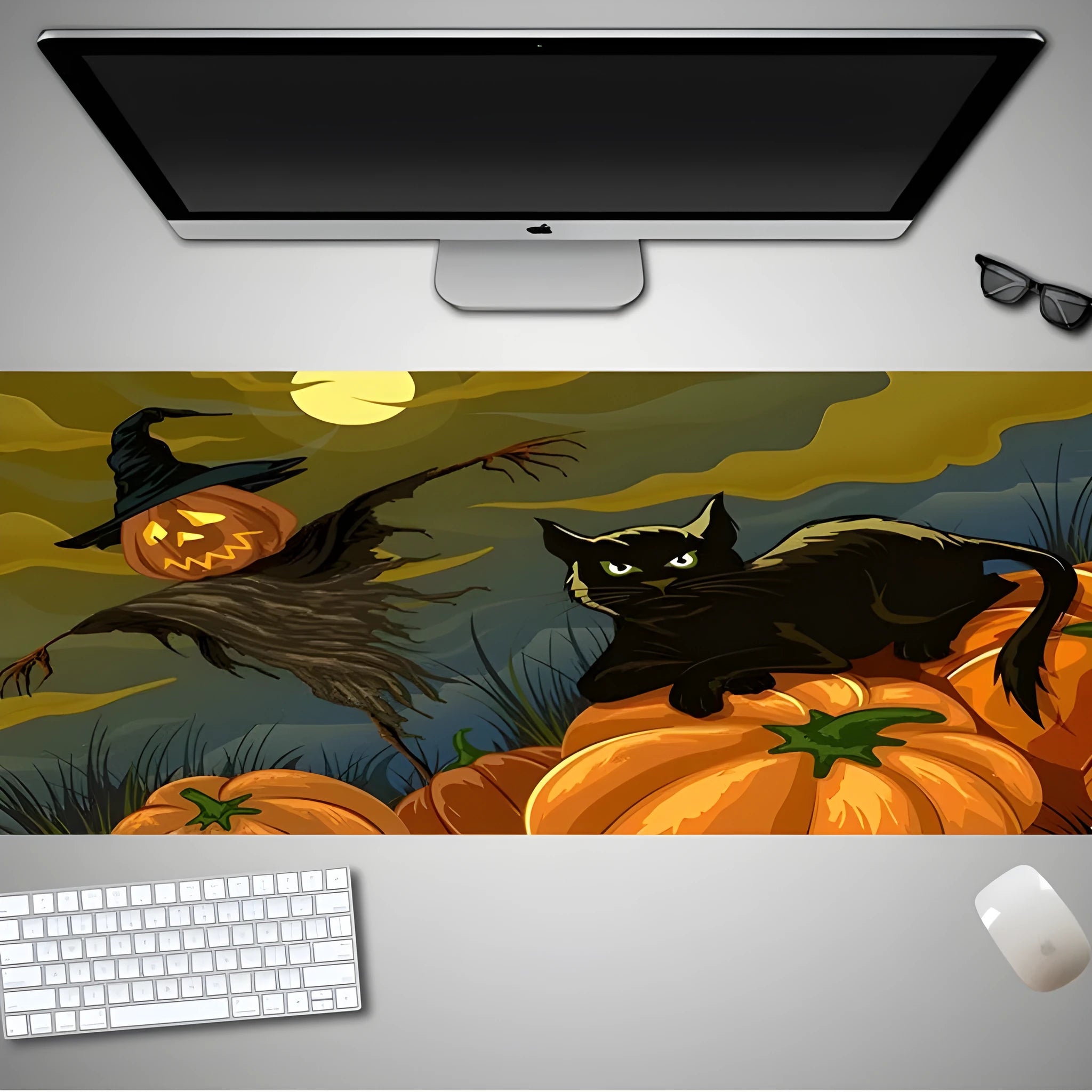 Oversized Halloween pattern rubber cloth mouse pad on a desk with non-slip base.