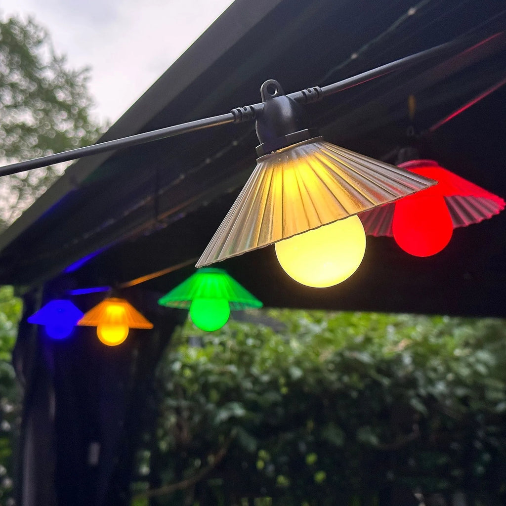 Outdoor LED string lights with flower-shaped bulbs in four colours or warm white, IP65 rated.