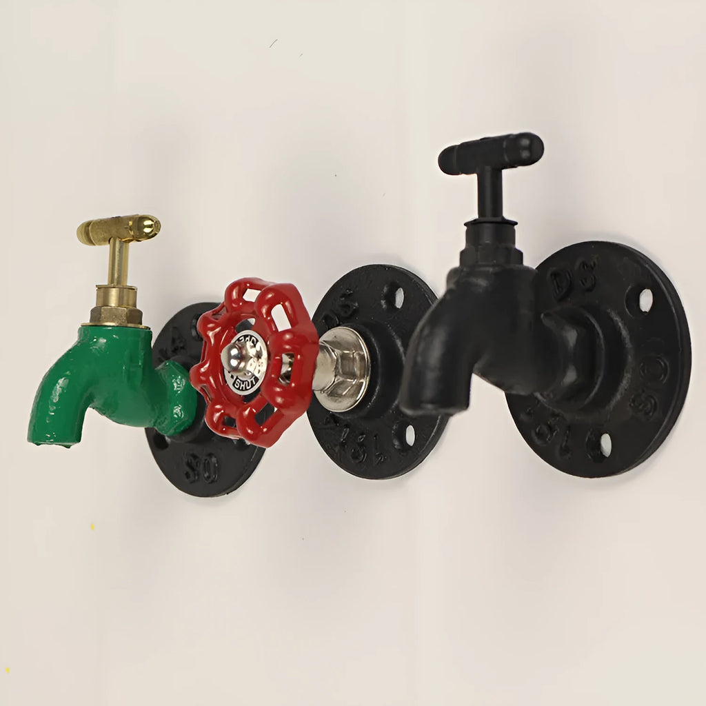 Metal water pipe style towel rack hook with polished chrome finish mounted on wall