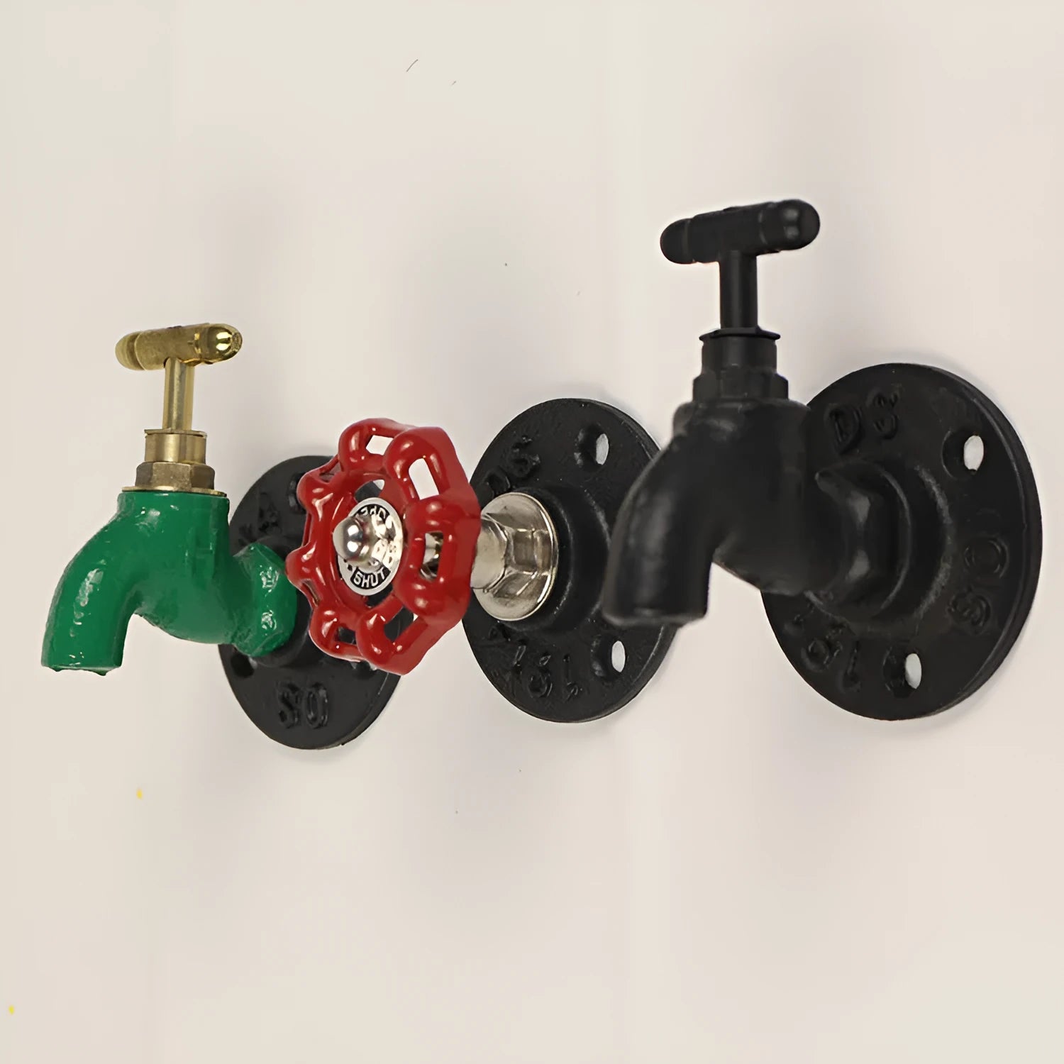Metal water pipe style towel rack hook with polished chrome finish mounted on wall
