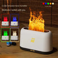 Black round ultrasonic aroma diffuser humidifier with flame effect LED lights and remote control on a table.