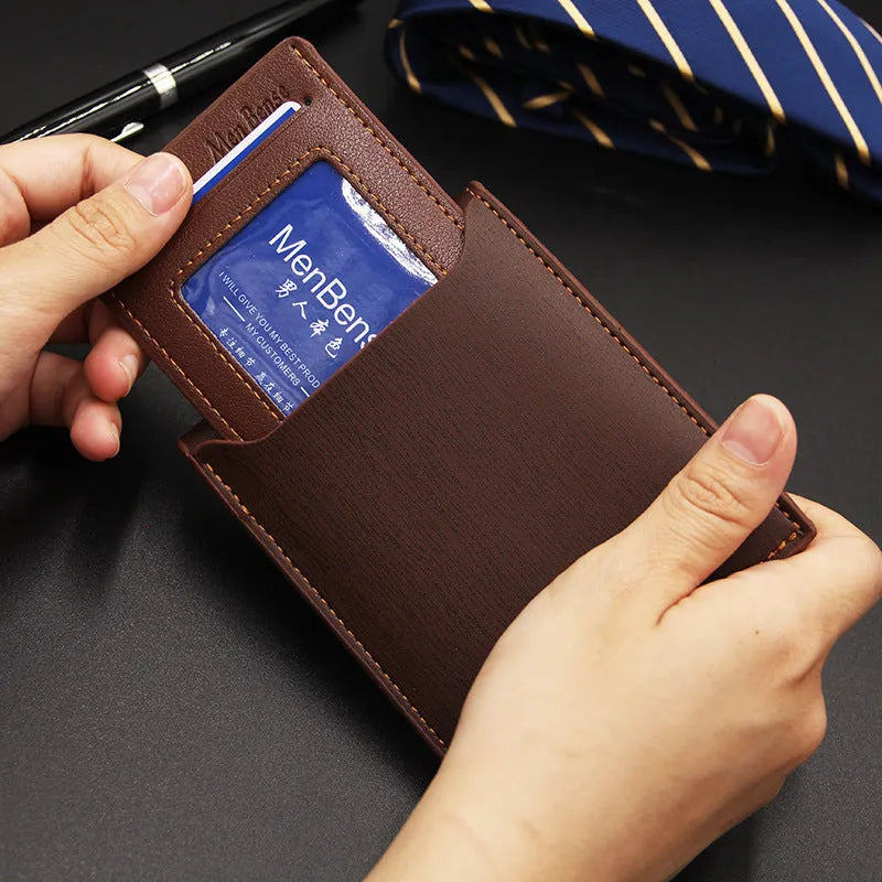 Men's black iron-edge card-picking wallet showing card slots and cash compartment.