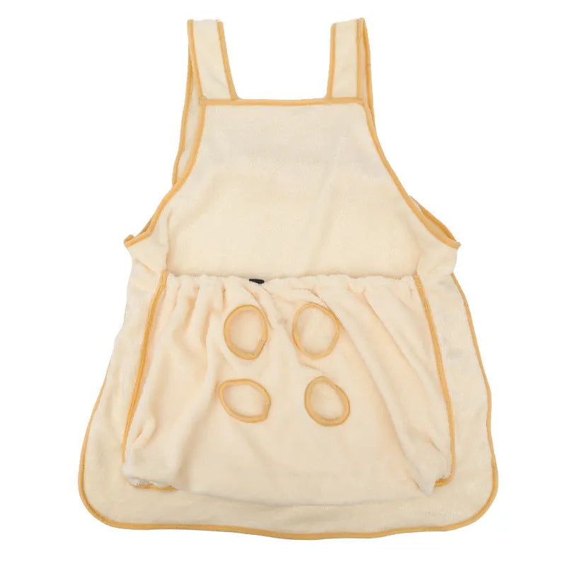 Beige plush pet carrier apron with adjustable neck strap and pet head opening