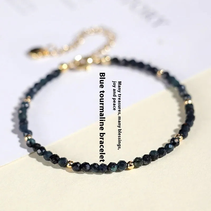 Blue tourmaline cut bead bracelet with 3mm faceted stones and spacer beads