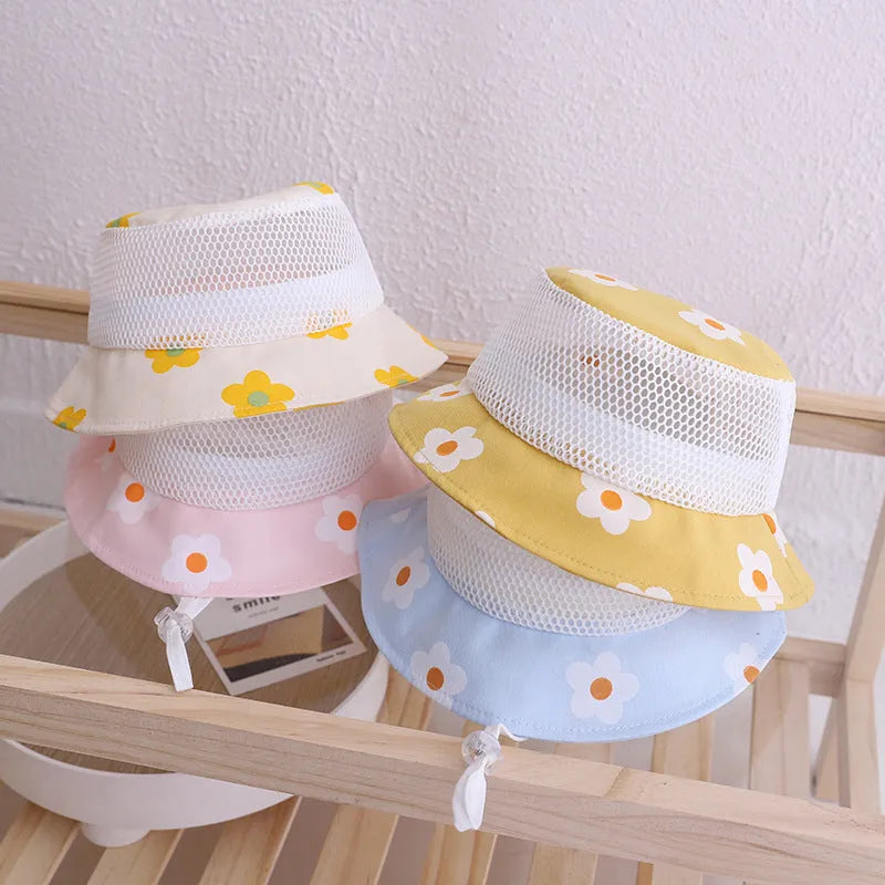 Floral baby bucket hat in mesh fabric, children cap for girls, available in blue, pink, white, and yellow