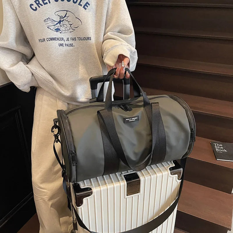 Waterproof Oxford cloth sports handbag in black, dark gold, and dark grey colour options