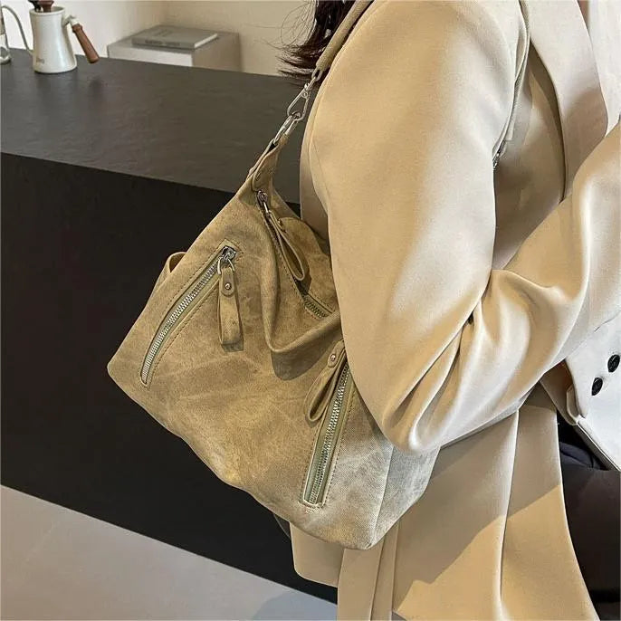 Large capacity women's casual shoulder bag in PU with sewing thread detail, available in denim blue, khaki, dark brown, light blue
