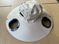 Men's grey solar fan cap with wide brim showing integrated cooling system